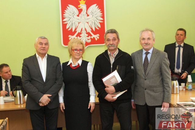 powiększ...